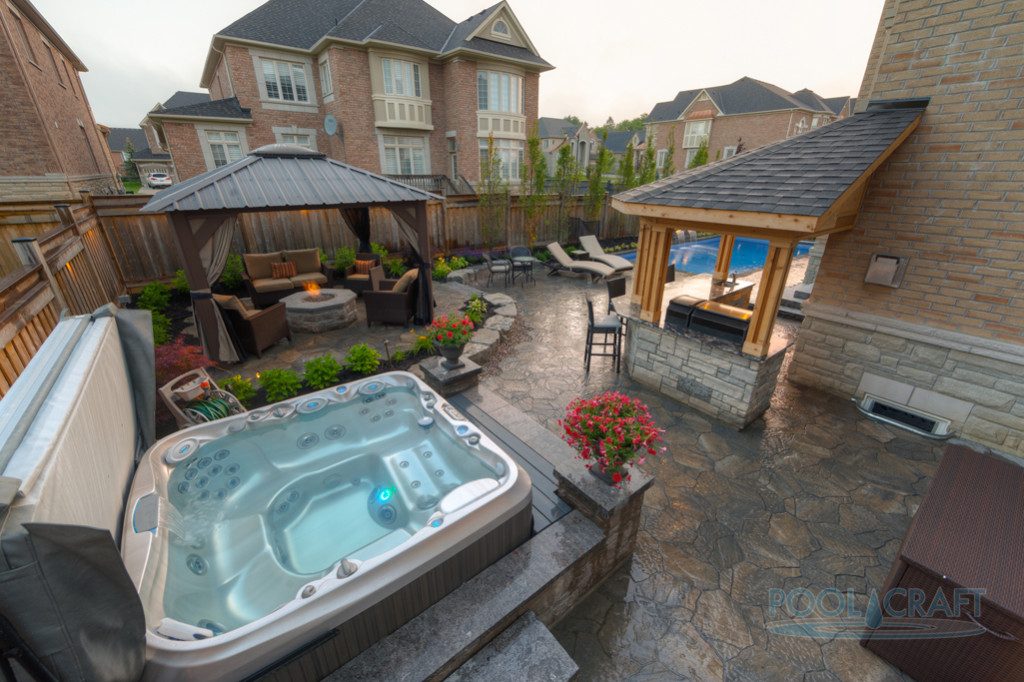 This small backyard pool and spa design makes the most of the available space!