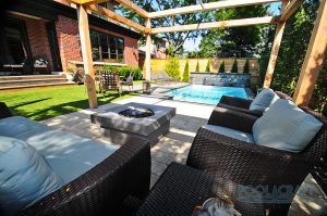 A backyard pool and patio, created by Pool Craft