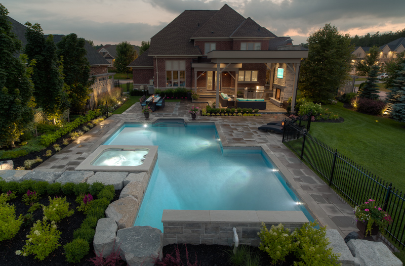 Offset rectangle pool installed by Pool Craft