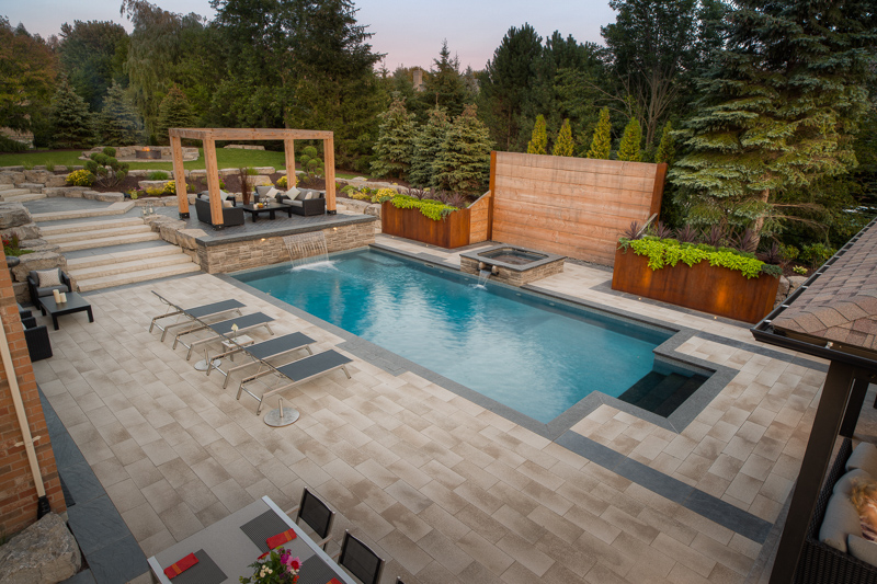 Custom backyard swimming pool designed by Pool Craft